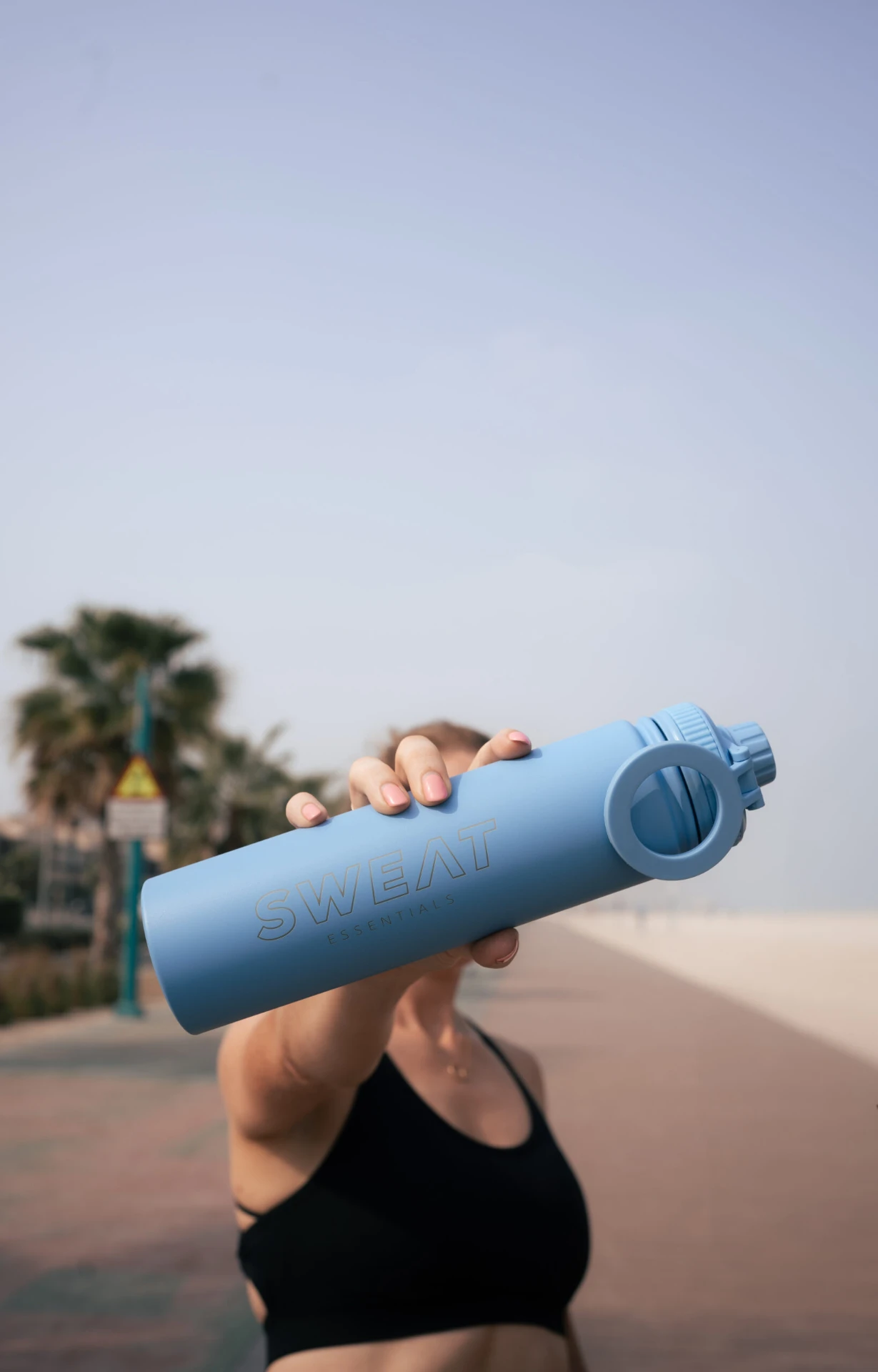 Sky blue — held to camera