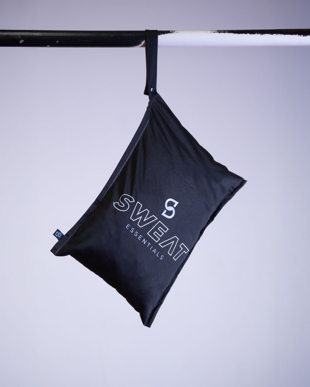 sweatSACK hanging from a gym bar